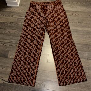 Stylish Black and Orange monogram Patterned women Pants